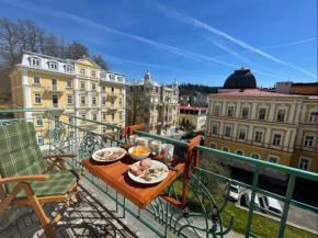 2 balconies above colonnade apartment